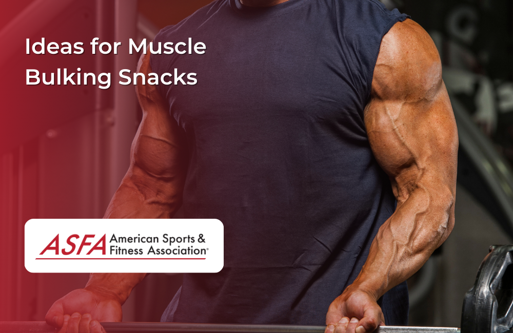 A close-up of a muscular arm in a gym setting.