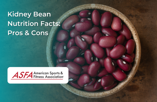 A bowl filled with red kidney beans placed on a wooden surface.