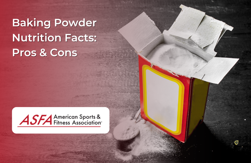 An open box of baking powder with some powder spilled onto a dark surface.