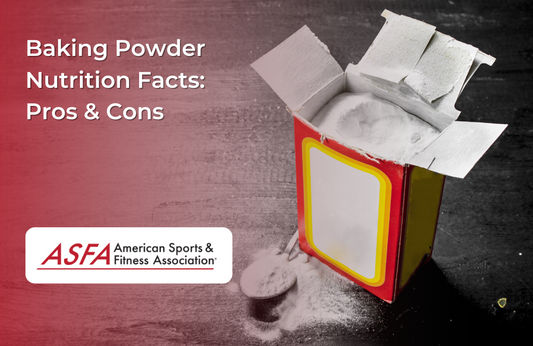 An open box of baking powder with some powder spilled onto a dark surface.
