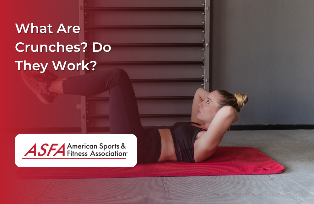 Lady in black exercise clothing performing a crunch on a red mat.