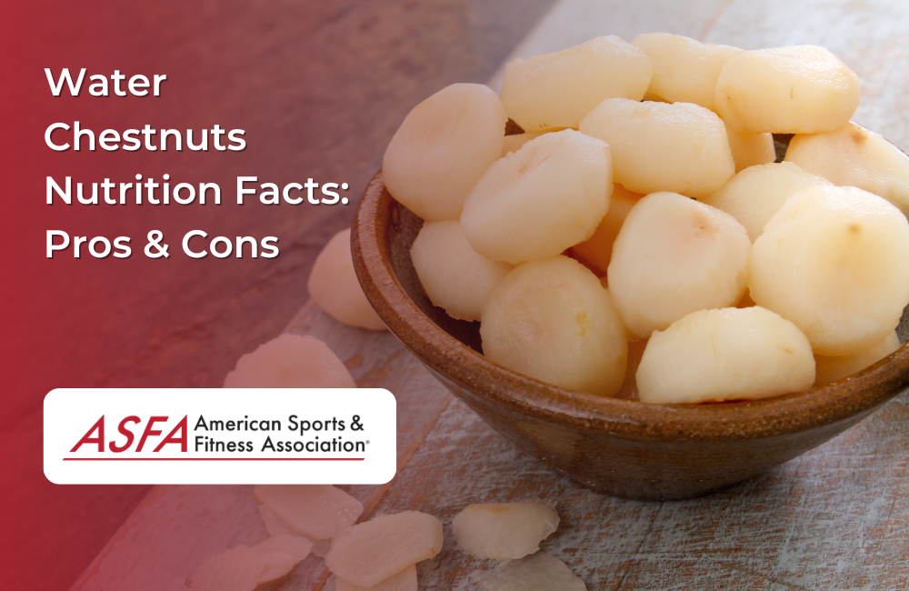 A bowl filled with peeled and sliced water chestnuts on a wooden surface.
