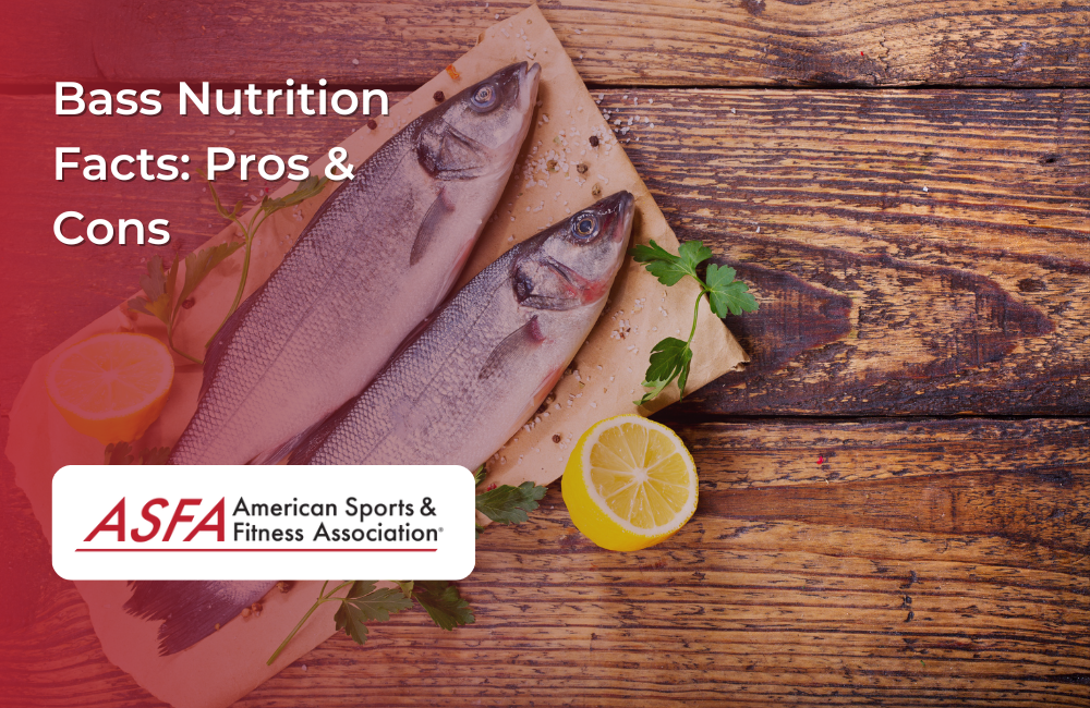 Two fresh bass fish on parchment paper, garnished with lemon slices and herbs.