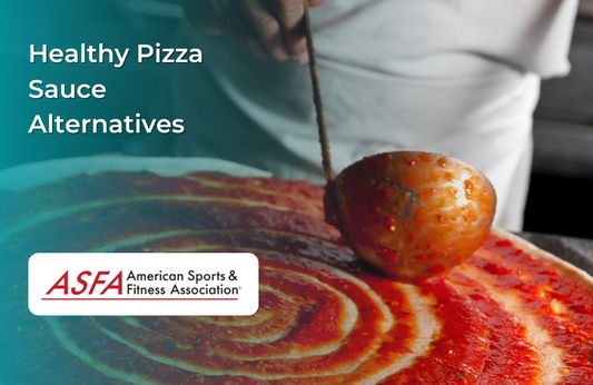 A chef spreads red pizza sauce on dough using a metal ladle, creating a spiral pattern.