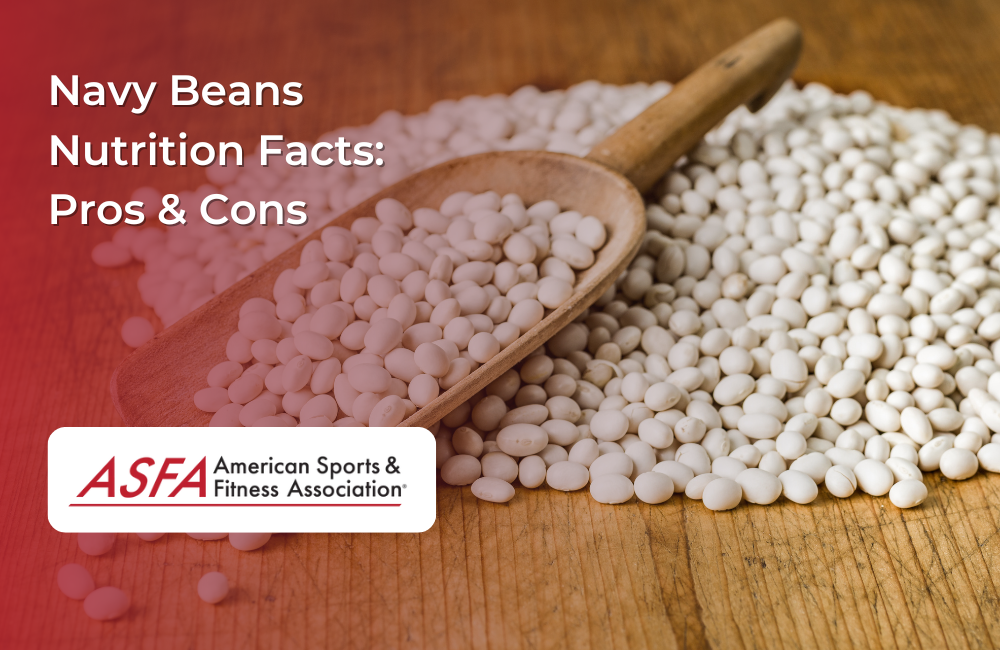 A wooden scoop filled with navy beans resting on a wooden surface, with more beans spilled around.