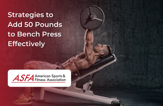 A man performs an incline bench press with a barbell against a dark wall.