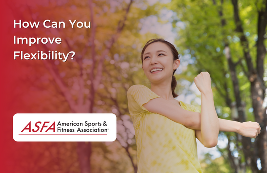 Lady in yellow shirt stretching her arm while outside near trees.