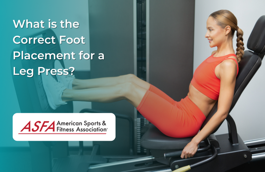 A lady in orange workout clothes doing leg presses in a gym.