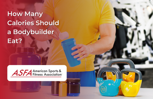 Man in yellow shirt putting protein powder in a shaker bottle in a gym..