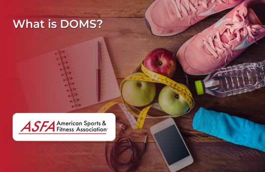 Workout shoes, apples, notebook, and a measuring tape.