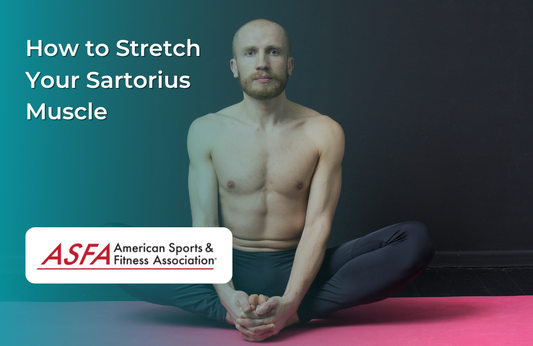 A person sitting on a yoga mat in a cross-legged position, performing a stretch.