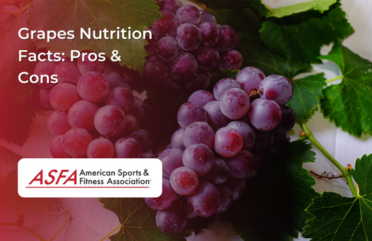  A close-up of plump, red grapes still attached to their vine.