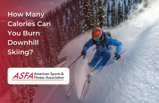 A person in blue ski clothes skiing downhill by trees.