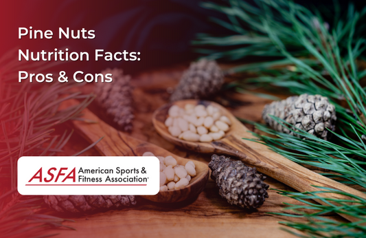Small wooden spoons filled with pine nuts, placed among pine cones and pine needles.
