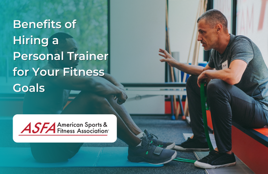 Pesonal trainer speaking with client.