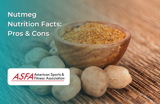 Whole nutmeg seeds and a wooden bowl filled with ground nutmeg, placed on a woven surface.