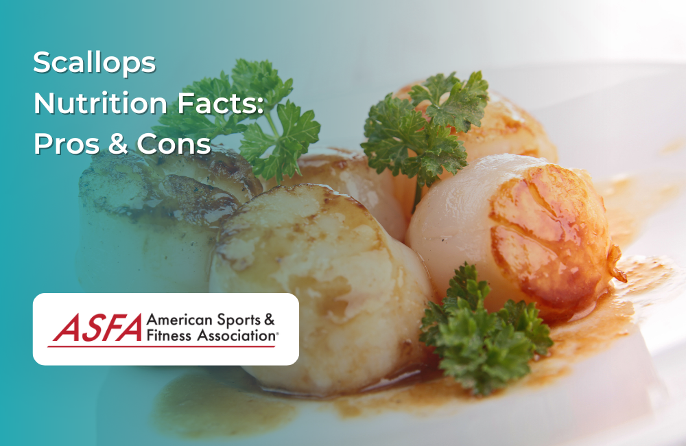 Seared scallops garnished with parsley, presented on a white plate with sauce.