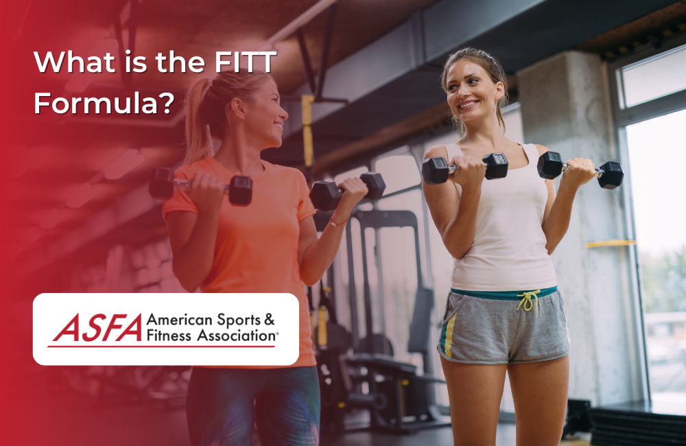Two ladies exercising with dumbbells in a gym..