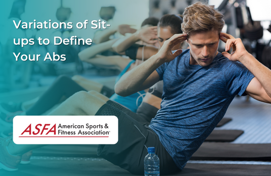 People performing sit-ups in a gym setting, focused on their abdominal exercises.