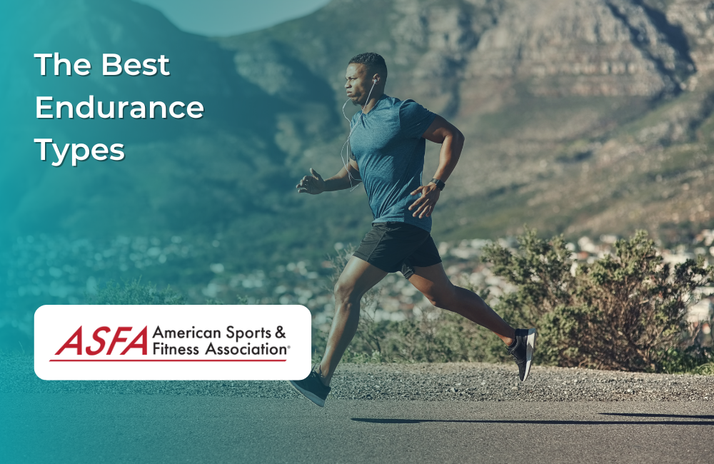 A man in athletic wear runs outdoors on a road with mountains in the background.