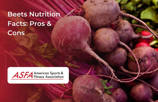 A bunch of fresh, red beets with their long stems still attached.