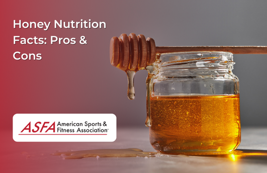 A glass jar filled with golden honey, with honey dripping from a wooden dipper.