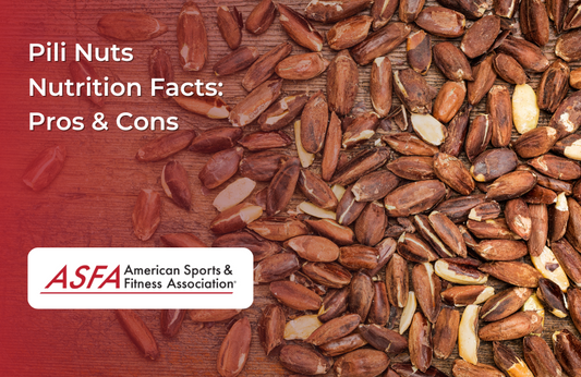 A close-up of scattered pili nuts, showing their smooth and glossy brown shells.