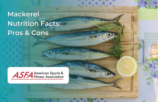 Fresh mackerel fish placed on a wooden cutting board with rosemary and a lemon slice.