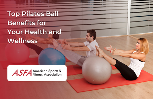 Three people seated on exercise mats using Pilates balls in a studio setting.