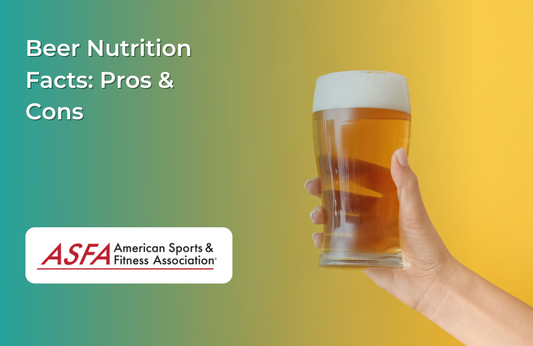  A glass of beer being held against a gradient background.