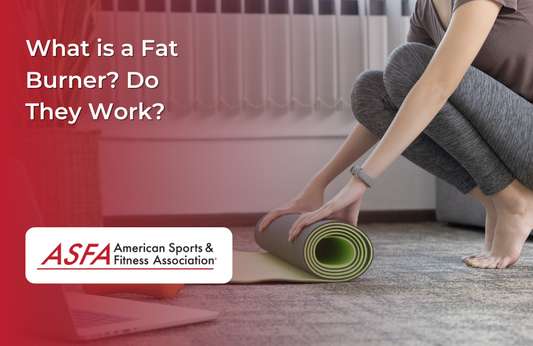 Lady rolling up a green yoga mat.