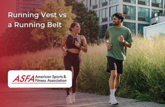 A man and woman jog together on a city path near tall grass and buildings. 