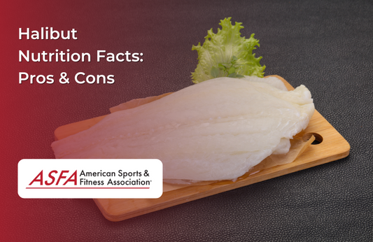 A raw fillet of halibut on a wooden cutting board with a garnish.