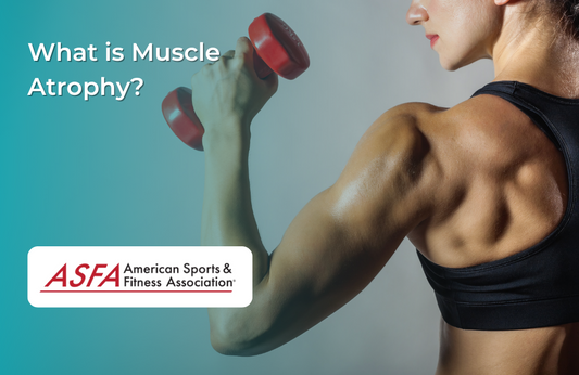 A close-up of a woman in a black sports bra lifting a red dumbbell.