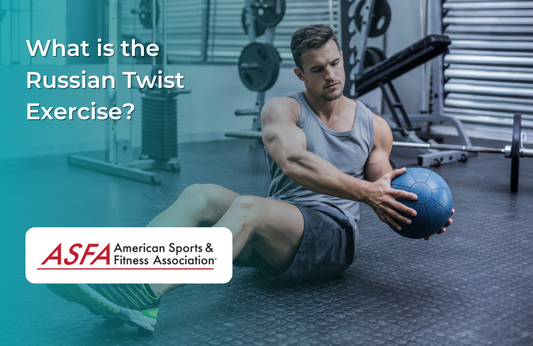 A man performing the Russian twist exercise with a medicine ball while sitting on the floor in a gym.
