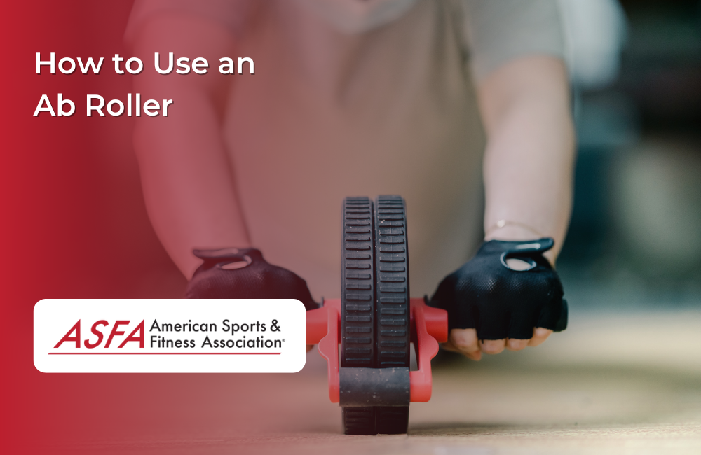 Person with gloves using an ab roller.