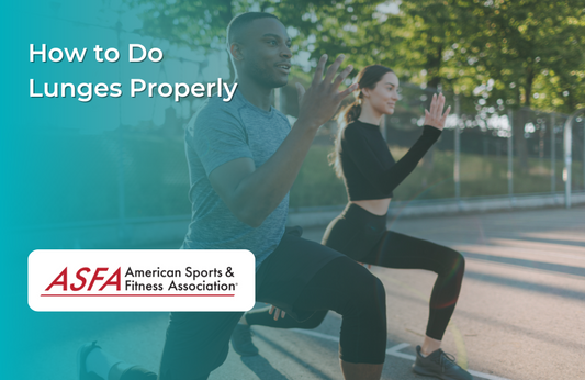 A man and woman doing lunges together on a blacktop outside. 