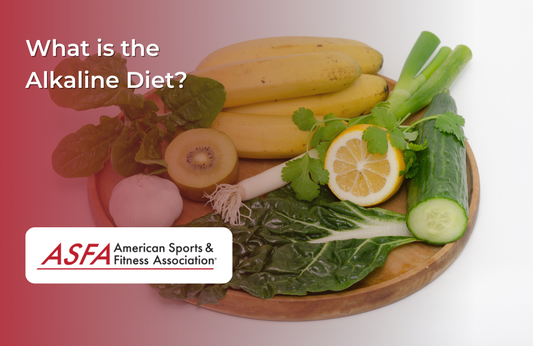 A wooden plate with bananas, cucumbers, and other fresh vegetables, representing the alkaline diet.