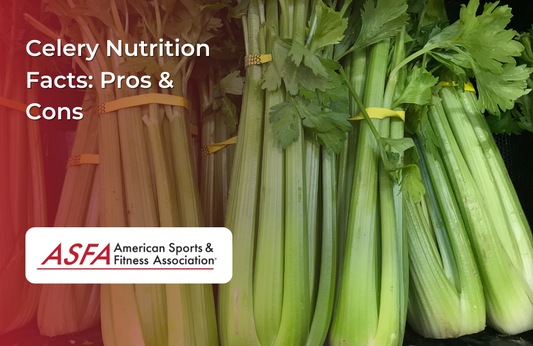 Fresh green celery stalks bundled together with yellow rubber bands, displayed in a grocery store.