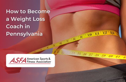 A close-up of a woman's midsection wearing athletic wear, measuring her waist with a yellow tape measure.