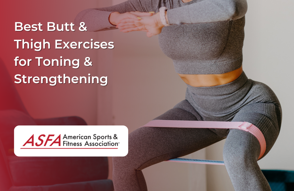 Lady in gray athleisure squatting with resistance bands