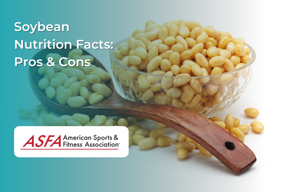  A glass bowl of cooked soybeans with a wooden spoon resting beside it.