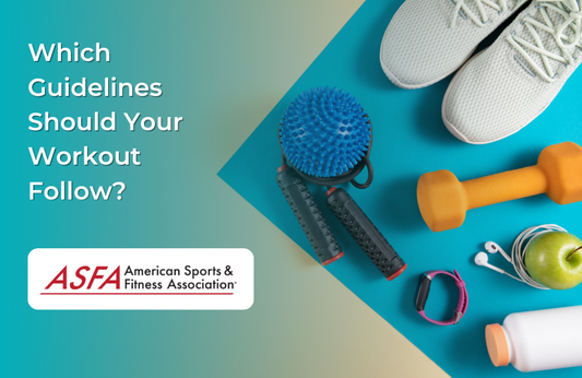 Various workout equipment on a blue yoga mat.