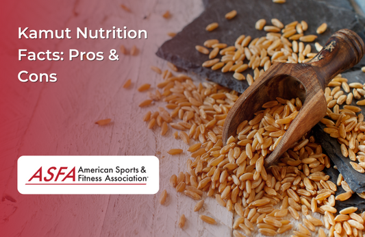 A wooden scoop filled with kamut grains, spilling onto a rustic surface.