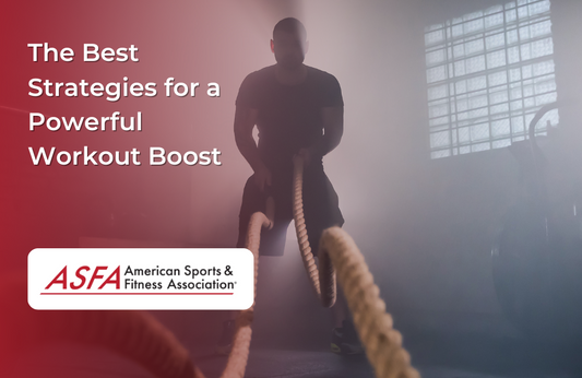 A man in a dim gym performing battle rope exercises in a misty atmosphere.