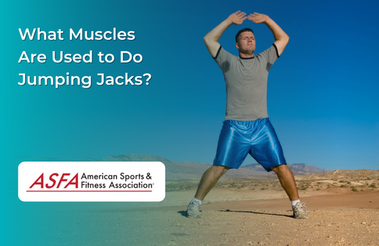 Man doing jumping jacks outside in the sand.