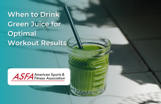  A glass of green juice with a straw sits on a sunlit tiled surface.