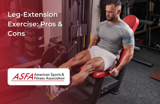 A man using a leg-extension machine in a gym, focusing on his quadriceps.