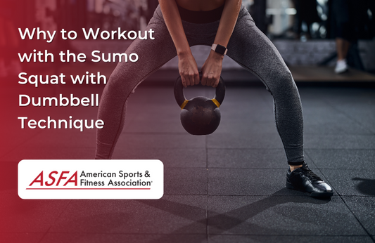  A person in workout attire performs a sumo squat holding a kettlebell in a gym.