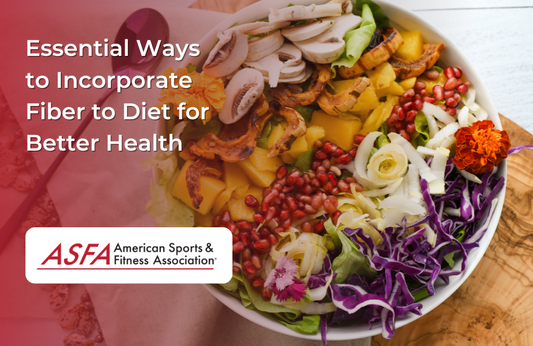 A colorful bowl of salad featuring a mix of vegetables, fruits, and edible flowers on a wooden board.